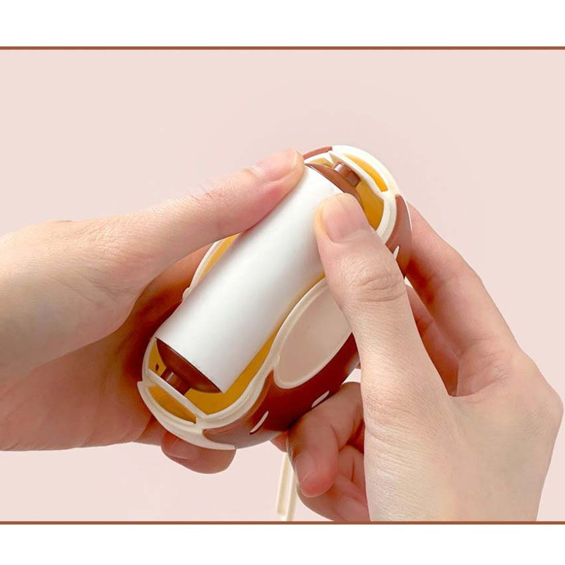 Put in the new cleaner - Il Jeong Donut-shaped Lint Roller Refill Pack