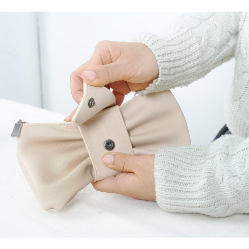 Snap button closure