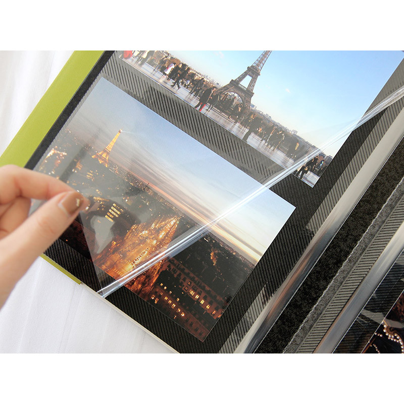 Adhesive photo album