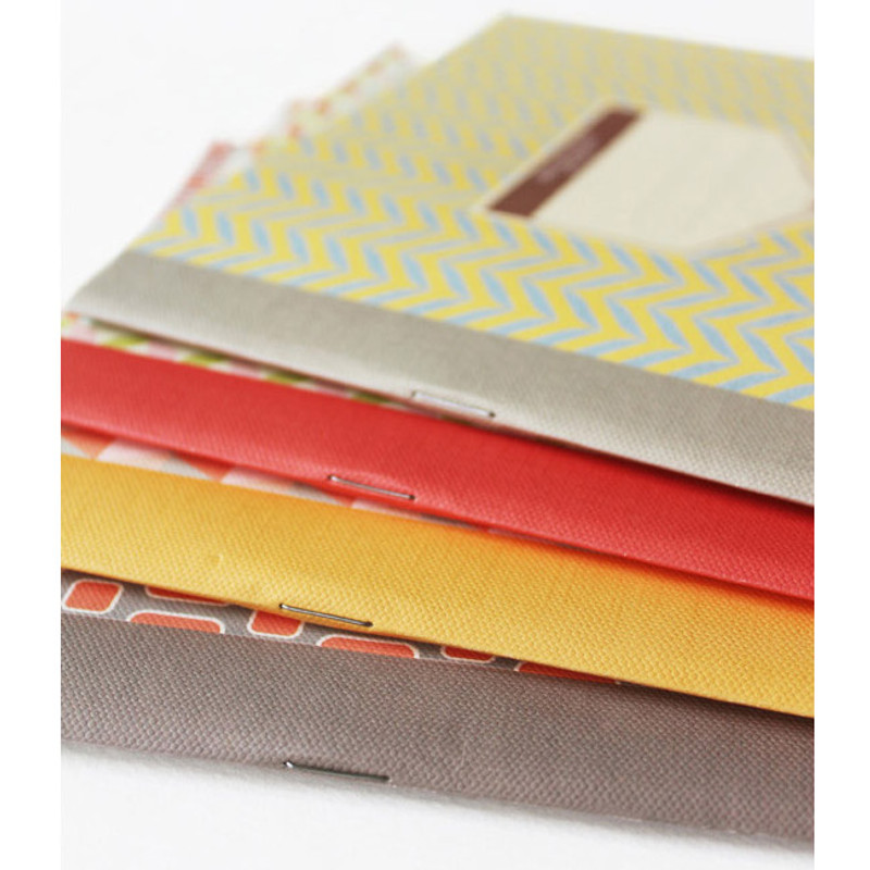 Detail of Story on geometric motif lined notebook Detail of Story on geometric motif lined notebook