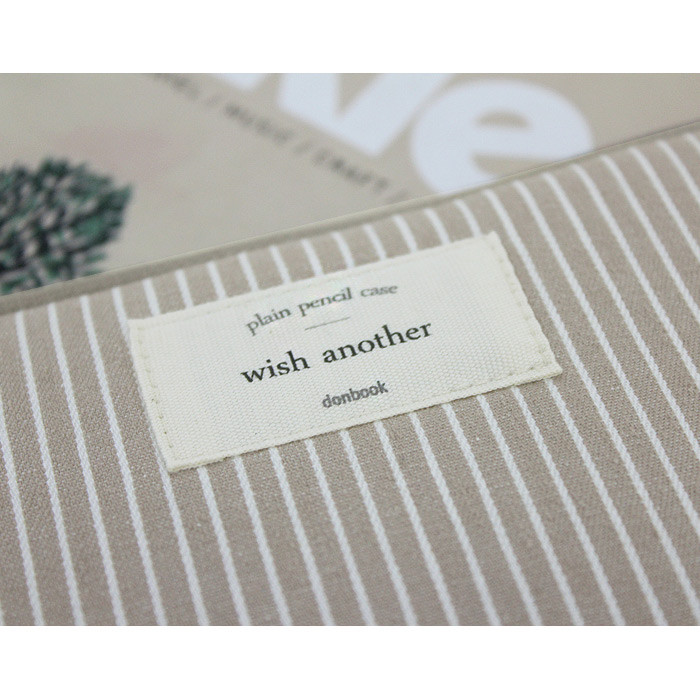 Detail of Mind stripe pattern zip around pencil pouch