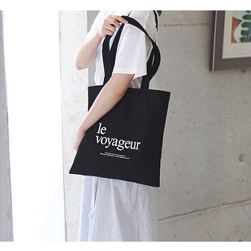 Le voyageur black cotton shoulder tote bag Le voyageur black cotton shoulder tote bag