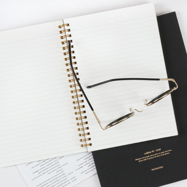 The classic gold spiral notebook