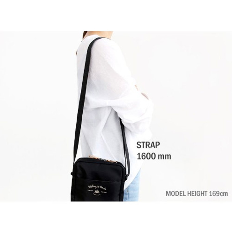 Size of Voyager double zippered crossbody bag