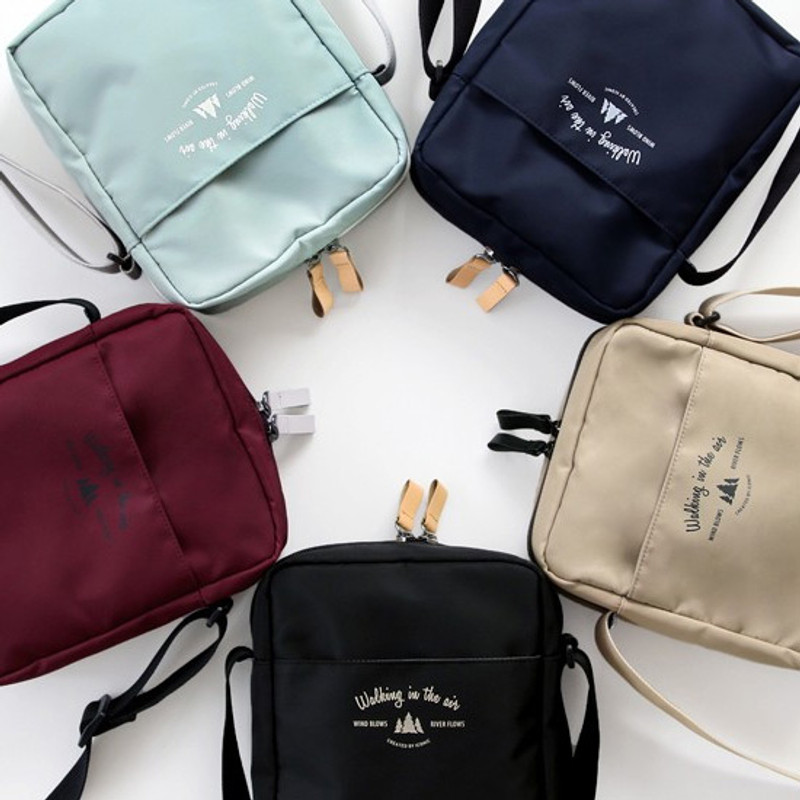 Voyager double zippered crossbody bag
