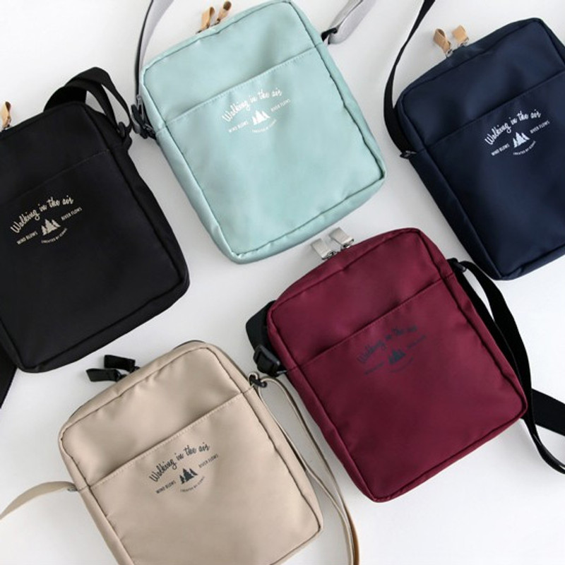Voyager double zippered crossbody bag