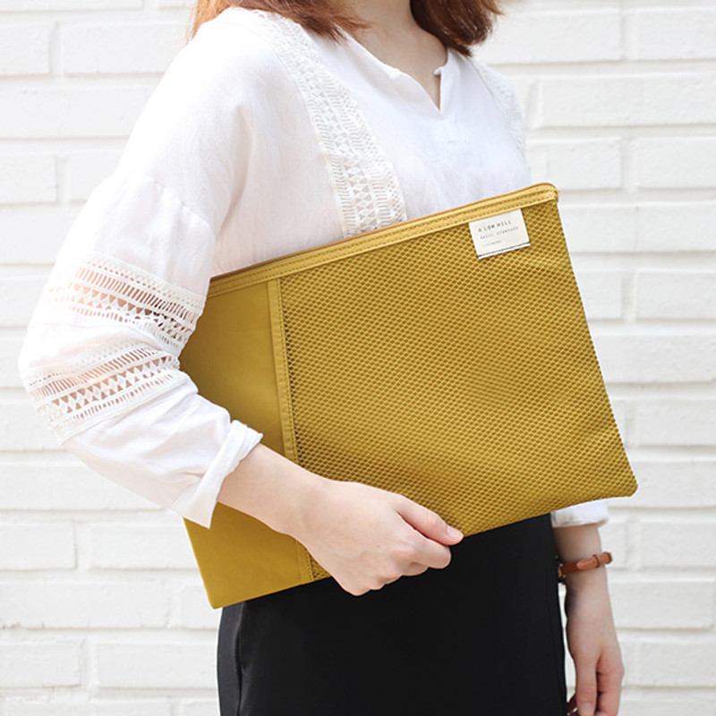 Mustard - A low hill basic mesh pocket file pouch Mustard - A low hill basic mesh pocket file pouch