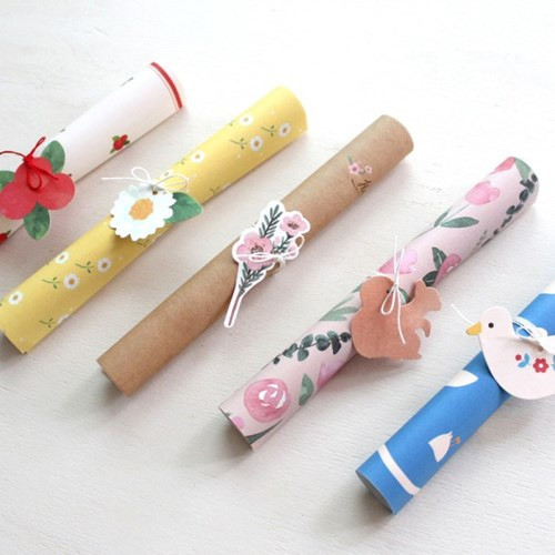 Nature rolled up letter with label and string