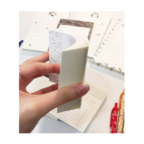 A plan in hand notepad To do list