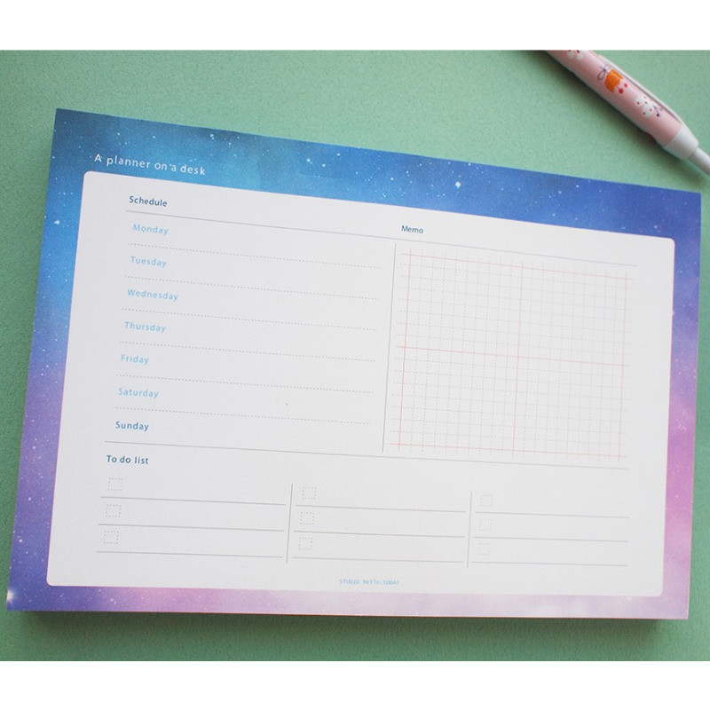 A - Hello Today Universe on a desk undated weekly planner notepad