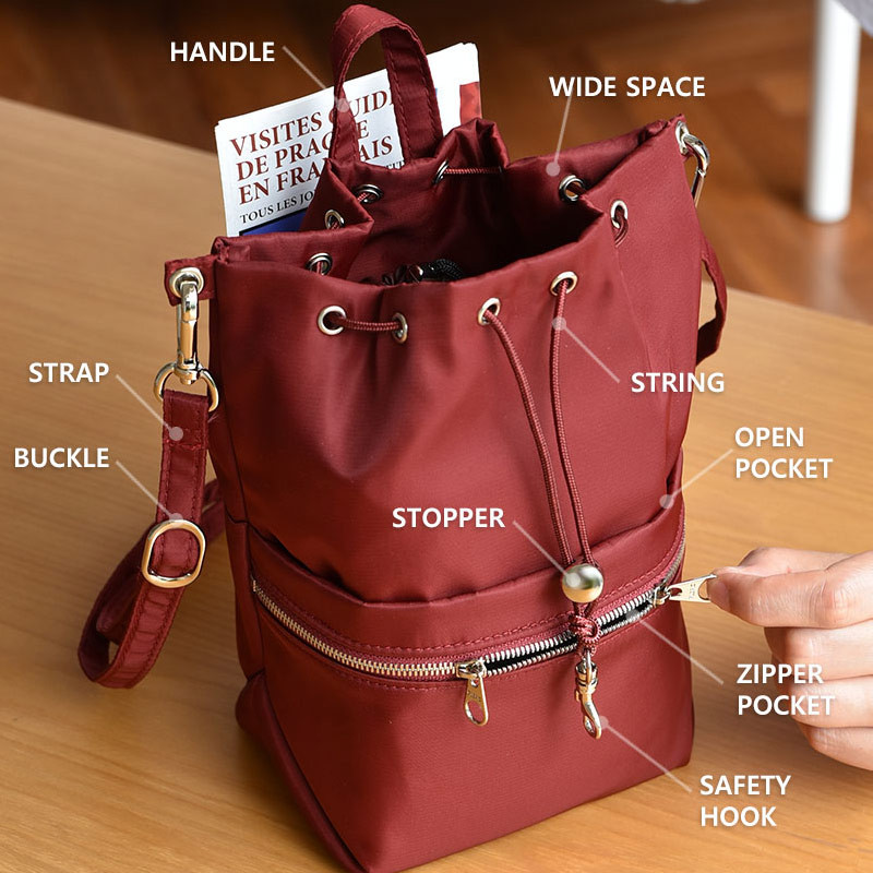 Detail of Holiday drawstring crossbody bucket bag Detail of Holiday drawstring crossbody bucket bag