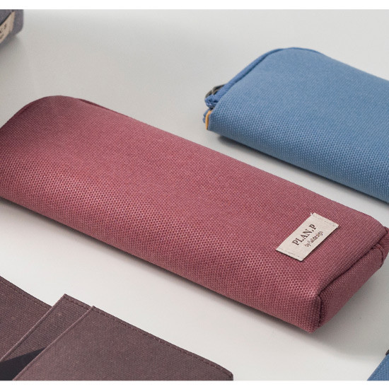 Detail of Oxford half zip around pocket pencil pouch