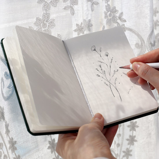 Example of use -  Prism 180 pages small blank notebook with elastic band