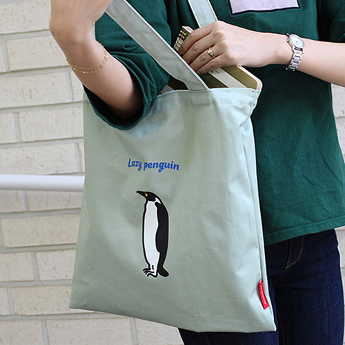 Lazy holiday penguin eco tote bag