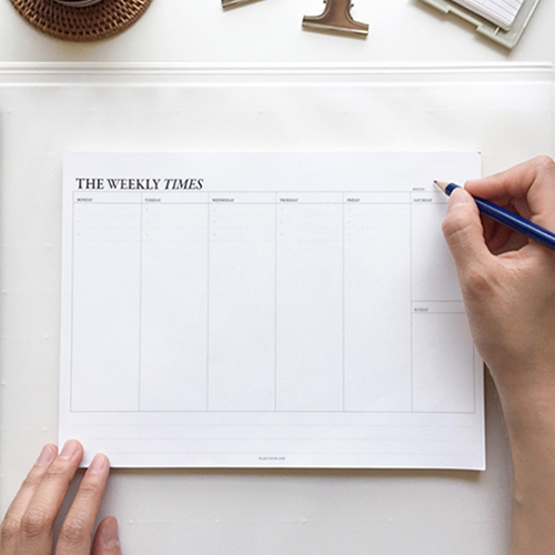 The Weekly times desk planner notepad with a zip lock pouch