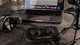 Vocaster One and HP60v studio headphones next to a laptop