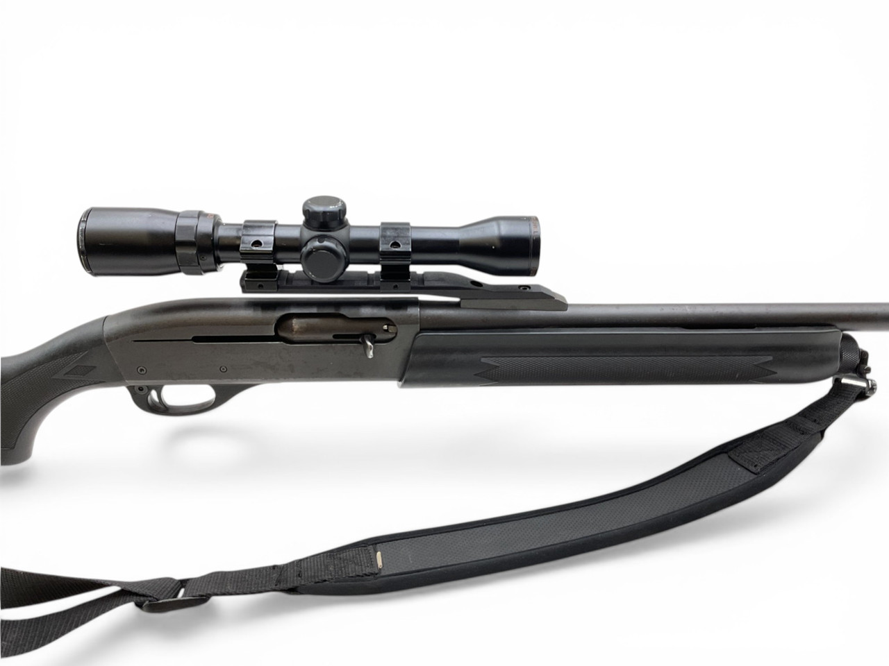 Remington 11-87 Sportsman Semi Auto Shotgun 20Ga 3" Chamber 21" Rifled Cantilever Barrel Synthetic Stock With Bushnell 1.75-4X32 Scope