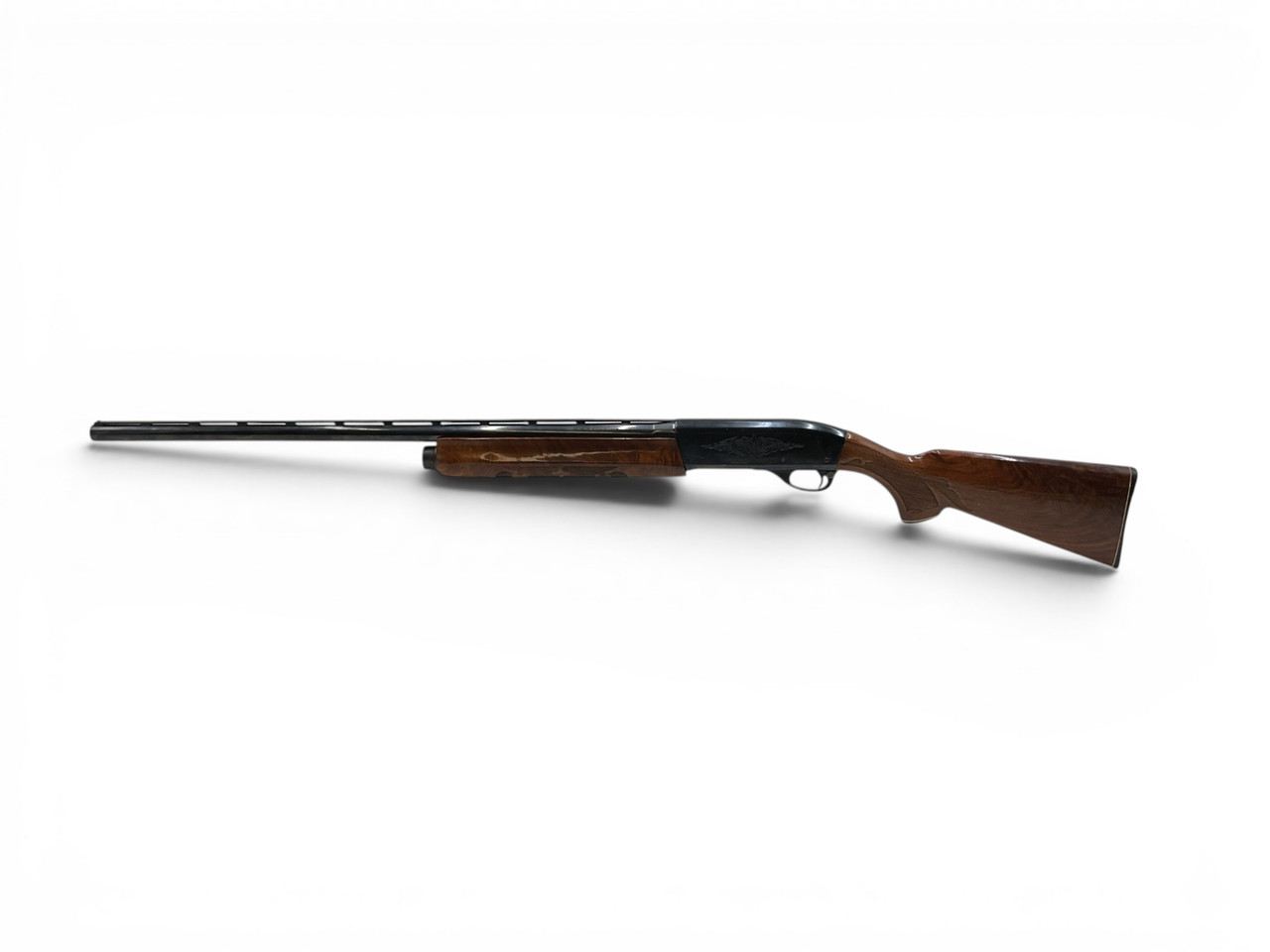 Remington 1100 Semi Auto Shotgun 12Ga 2.75" Chamber 28" Vent Rib Barrel Wood Stock