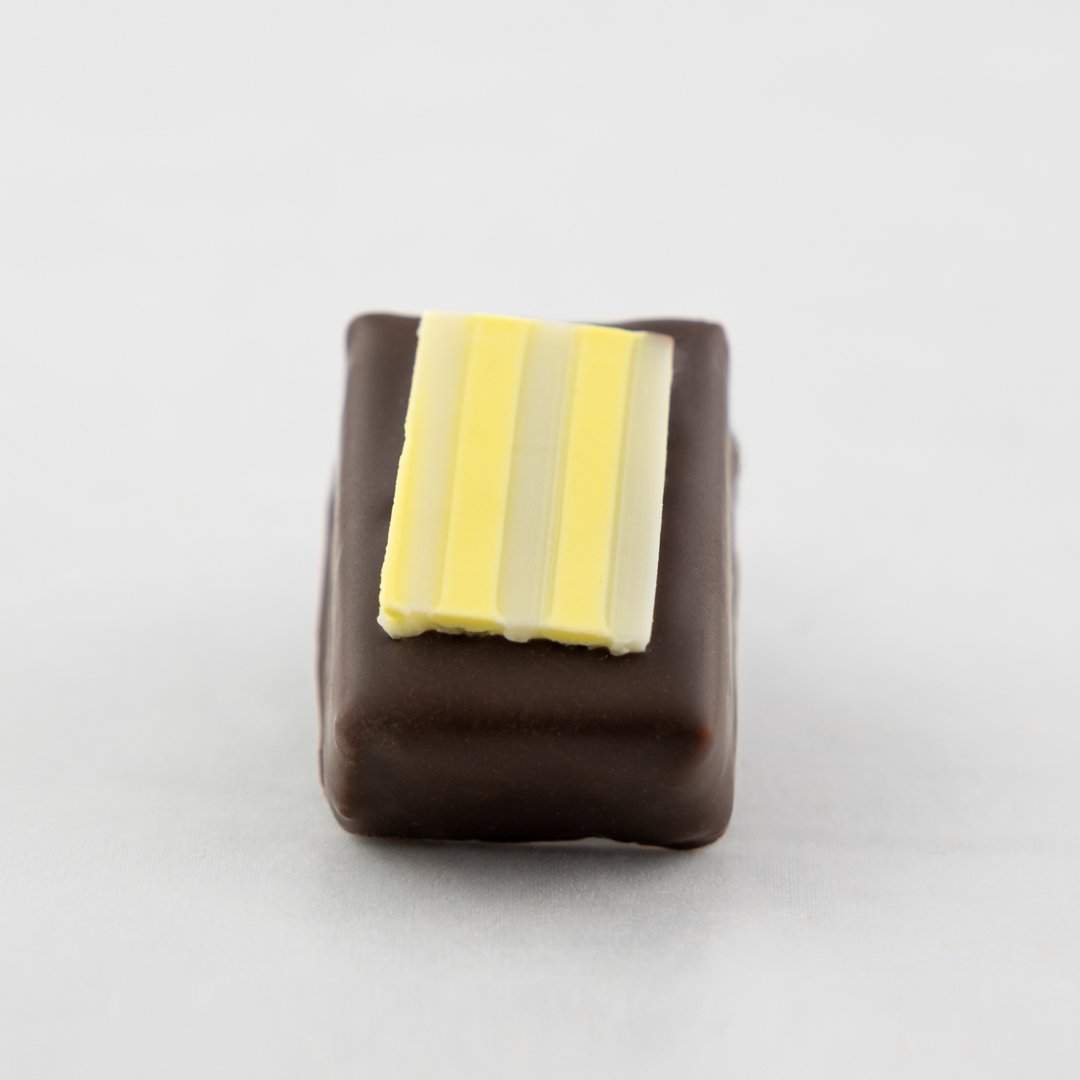 White chocolate lemon ganache in dark chocolate