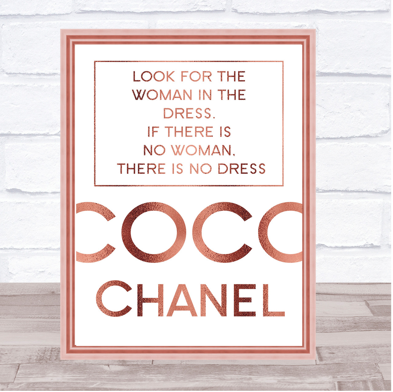 Coco Chanel Quote print. A woman can be over dressed Poster
