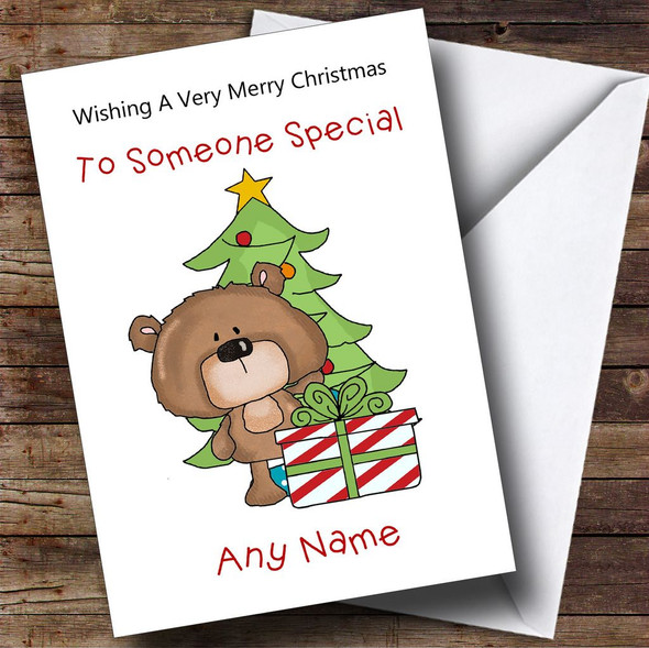 Cartoon Bear With Present & Tree Children's Personalised Christmas Card