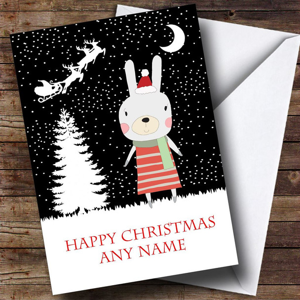 Rabbit On A Snowy Night Children's Personalised Christmas Card