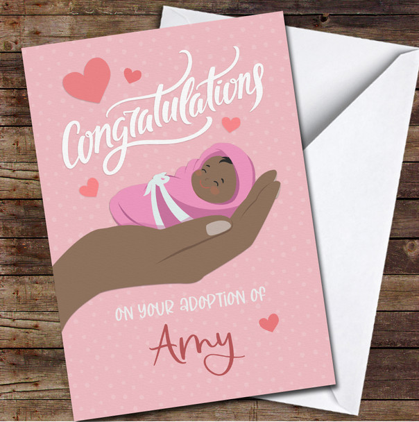 Pink Background Dark Skin Hand Holding New Baby Adoption Personalised Card