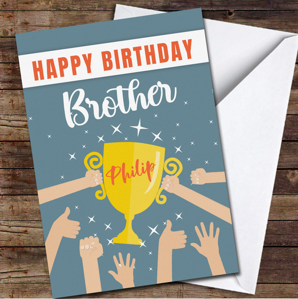 Light Skin Hands Holding Gold Trophy Happy Brother Personalised Birthday Card