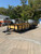 STR8220LS-E2 --- 2027 Sure-Trac 82" x 20' Tandem Axle Landscape Trailer with 2' Wood Sides and Rear Gate - 9,990 GVWR #ST1033