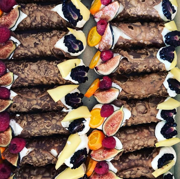 Assorted fresh cannoli with fruit