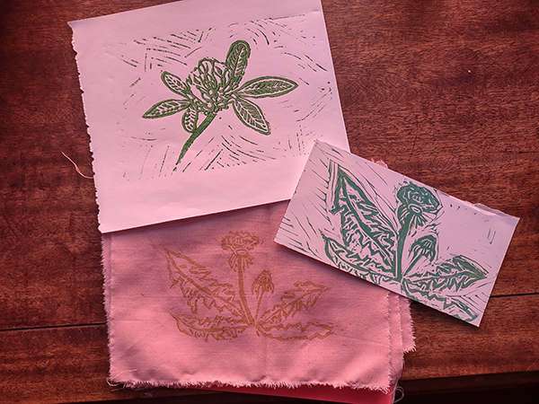 Green blue and tan blockprints of plants