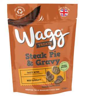 Brown dog treat bag, "Wagg" brand, "Steak Pie & Gravy" flavour, with dog tail graphic, UK made, recyclable packaging.