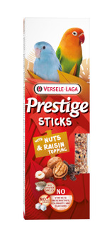 Bird food stick packaging, red, with parrots, nuts, and raisins.