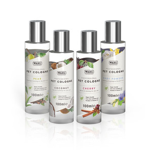 Four Wahl Pet Cologne bottles: pear, coconut, cherry, and baby powder. Silver caps, clear bottles.