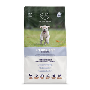 Dog food bag, white and green, puppy image, "Sporting Puppy" label.