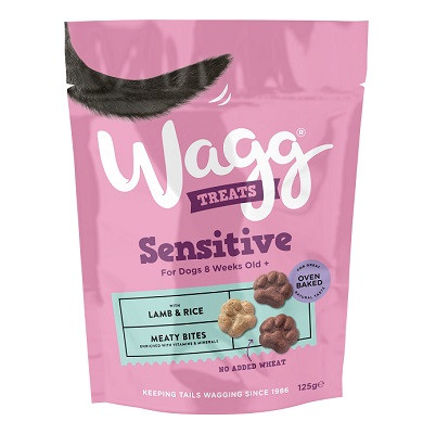 Pink Wagg Sensitive dog treat bag, with paw-shaped treats, lamb & rice, and a dog tail.