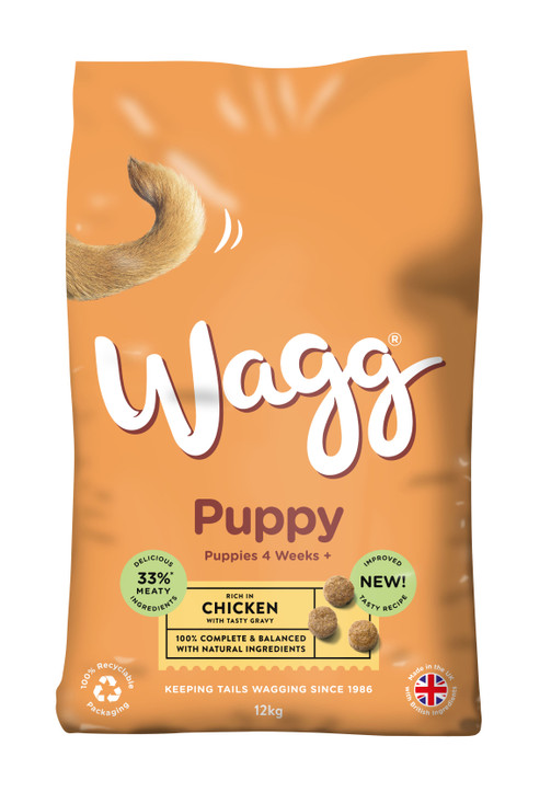 Orange Wagg Puppy Complete Chicken food bag. Features a dog tail, "Puppy" text, and "Chicken" label.