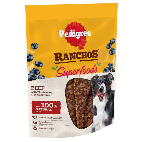 Pedigree Ranchos Superfoods dog treats with beef, blueberries, and whole grains. Yellow and white packaging with a dog.