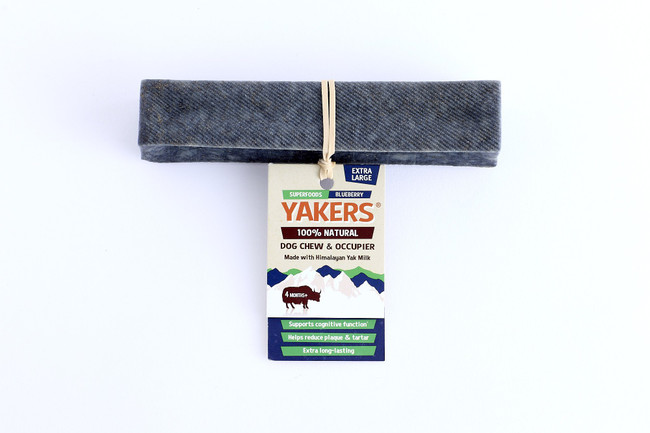 Blueberry Yakers dog chew, extra large, with a tag, on a white background.