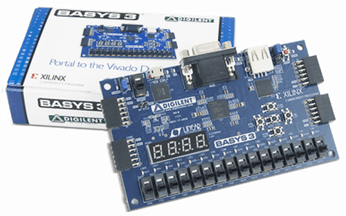 Basys 3 Artix-7 FPGA Trainer Board product image displayed next to its custom packaging. 