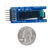 Size comparison product image of the Pmod OLED: 128 x 32 Pixel Monochromatic OLED Display and a US quarter (diameter of quarter: 0.955 inches [24.26 mm]; width: 0.069 inches [1.75 mm]).