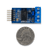 Size comparison product image of the Pmod RS485: High-speed Isolated Communication and a US quarter (diameter of quarter: 0.955 inches [24.26 mm]; width: 0.069 inches [1.75 mm]).