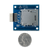 Size comparison product image of the Pmod SD: Full-sized SD Card Slot and a US quarter (diameter of quarter: 0.955 inches [24.26 mm]; width: 0.069 inches [1.75 mm]). 