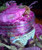 Spring Casting Herbs – Seasonal Ritual Blend with Rose Quartz, herbal blend with dried flowers and herbs in a glass jar.
