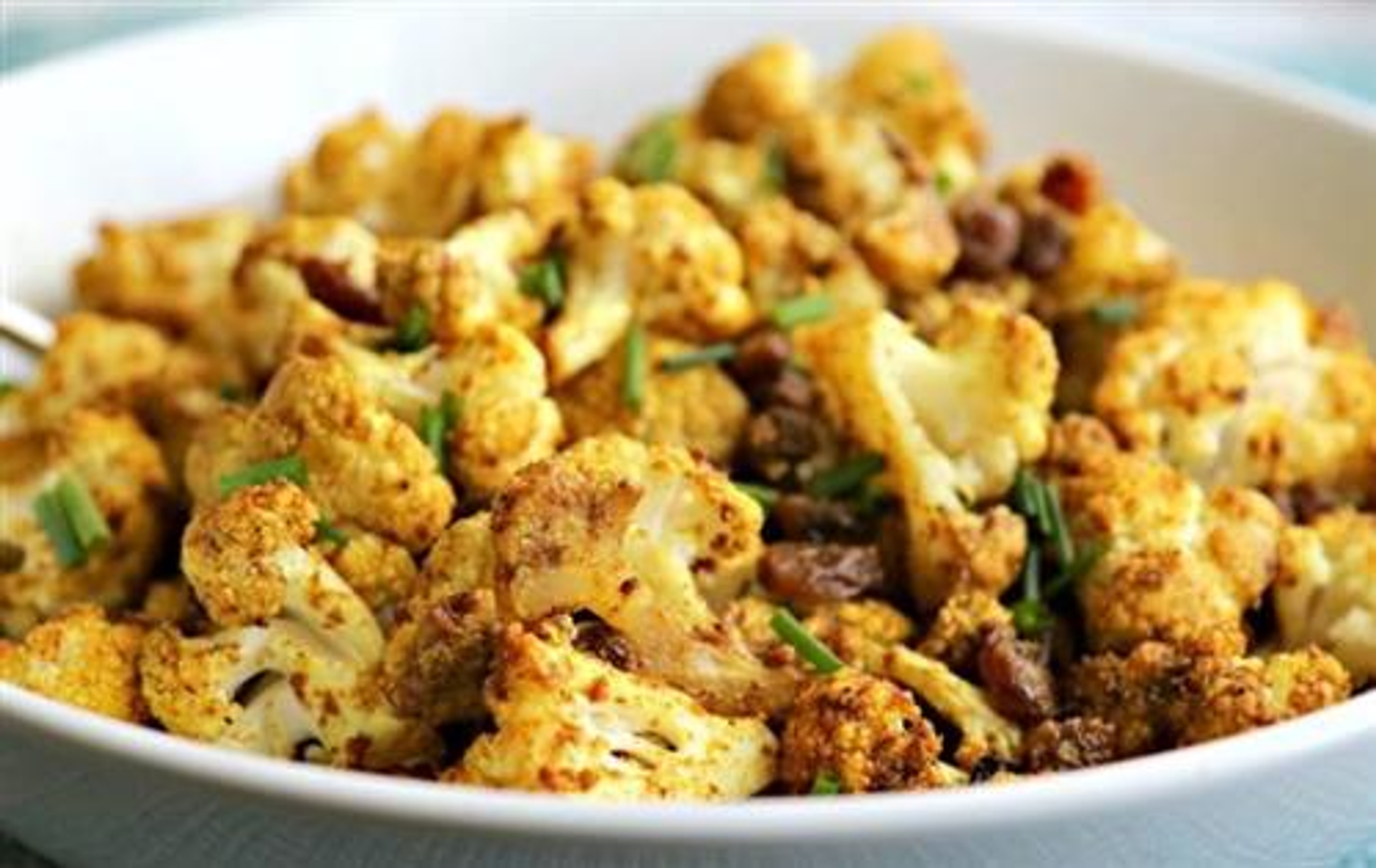 Roasted Cauliflower with Curry and Golden Raisins.