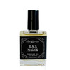 Ollie + Max Black Magick Perfume Oil - 1/2 oz., black label with white ornate design and product details.