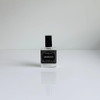 Ollie + Max Moonlight Perfume Oil - 1/2 oz, a clear glass bottle with black label and black cap, containing perfume oil for a fragrant and luxurious scent.