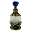 Uncommon Scents #12 Blue Perfume Bottle - 15ml Round, elegant vintage-style perfume bottle with a white glass body and ornate bronze metallic accents with blue gemstones, topped with a blue faceted cap.