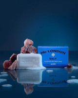 Wavertree & London Mr London Salt Soap Bar - 10oz (280g), white soap bar with salt crystals and salt stones, packaged in a blue box with bold text, on a reflective surface with soap bubbles and salt crystals.