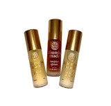 Kuumba Made Exotic Elegance Collection - 3 assorted 0.15 oz fragrance oils, including Golden Sky, Tunisian Opium, and Wind Dancer, in small bottles with gold caps.